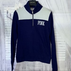 Pink blue and white half front zip up.